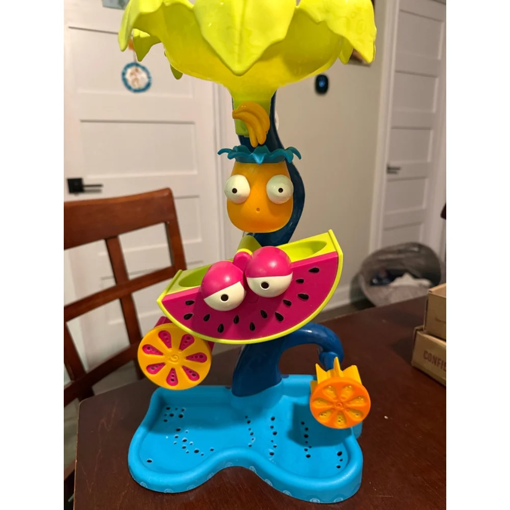 B. Toys Water Wheel Toy Tropical Waterfall with bird cup